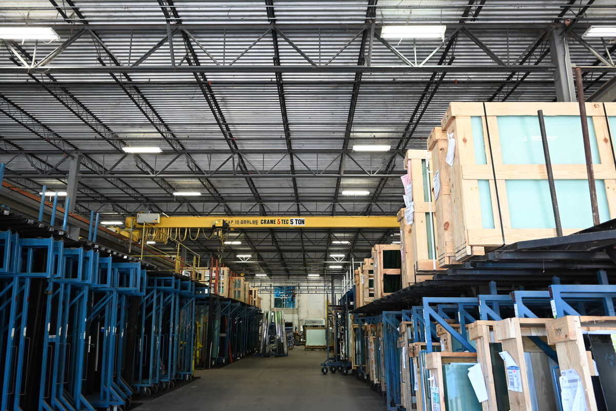 photo of warehouse racks with glass products on them